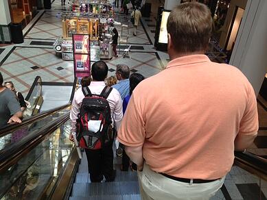 Why do people stand still on escalators